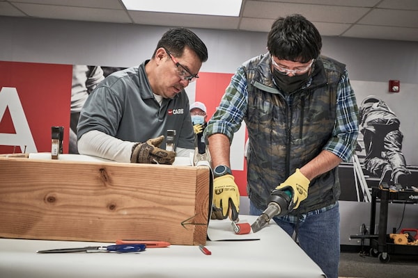 GAF training roof contractors at a CARE course