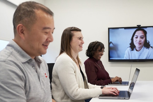 Three GAF employees enhancing their career in a conference