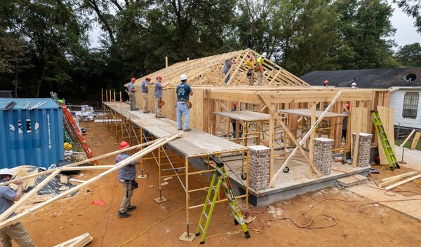 GAF employees volunteering with Habitat for Humanity in their community