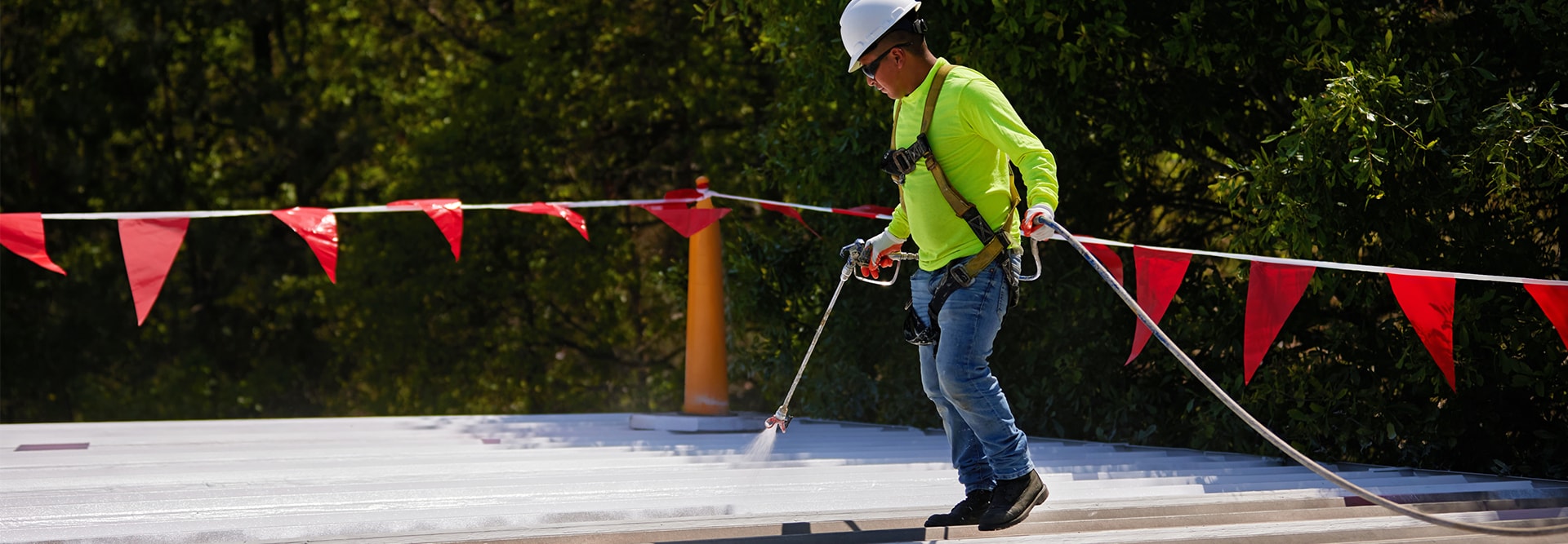 Roofers on top of commercial roof