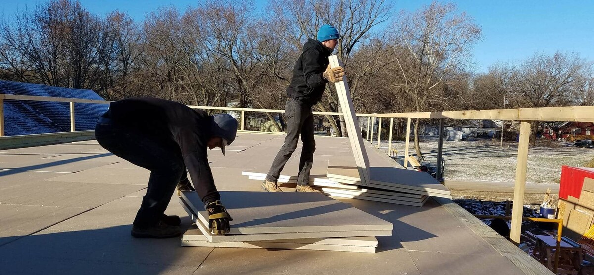 Graduate students at University of Kansas Building a sustainable home with a GAF roof membrane