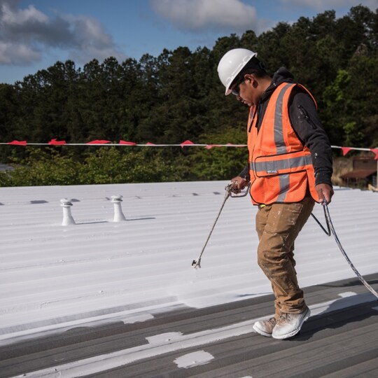 GAF contractor using United Coatings Roof-Shield fast-dry acrylic