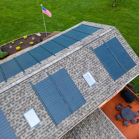 Aerial view of gray roof with Timberline solar roofing shingles
