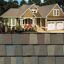 GAF Timberline HDZ  golden harvest shingle closeup with sample product image on a brown house.