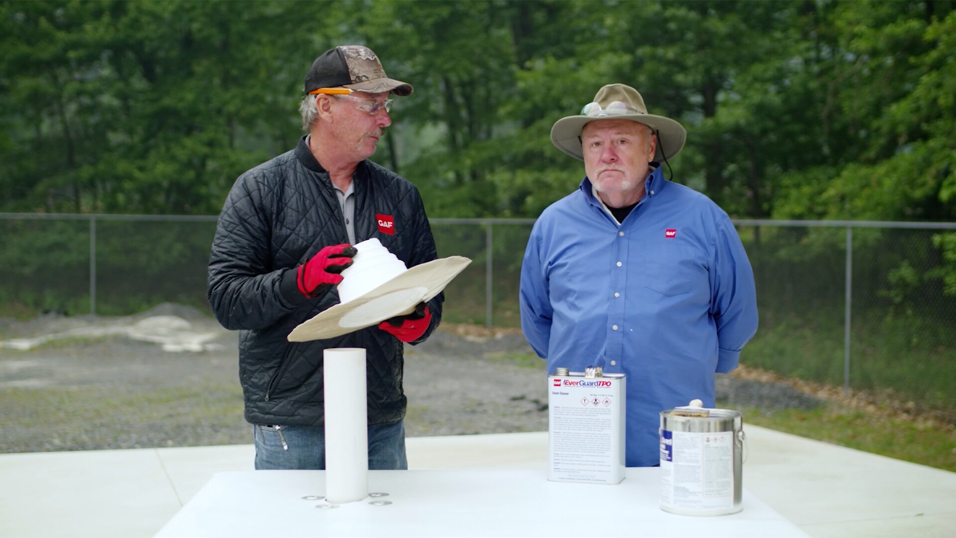 Dave and wally demonstrating how to use self adhered vent boot. 